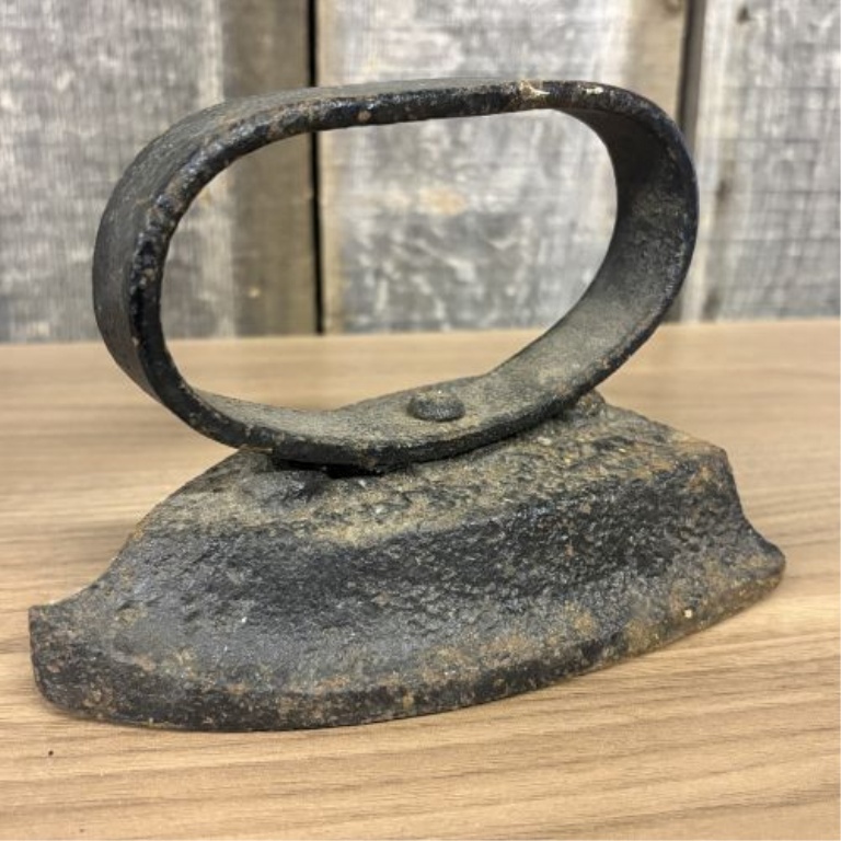 A Set of Four Antique Cast Iron Sad Irons