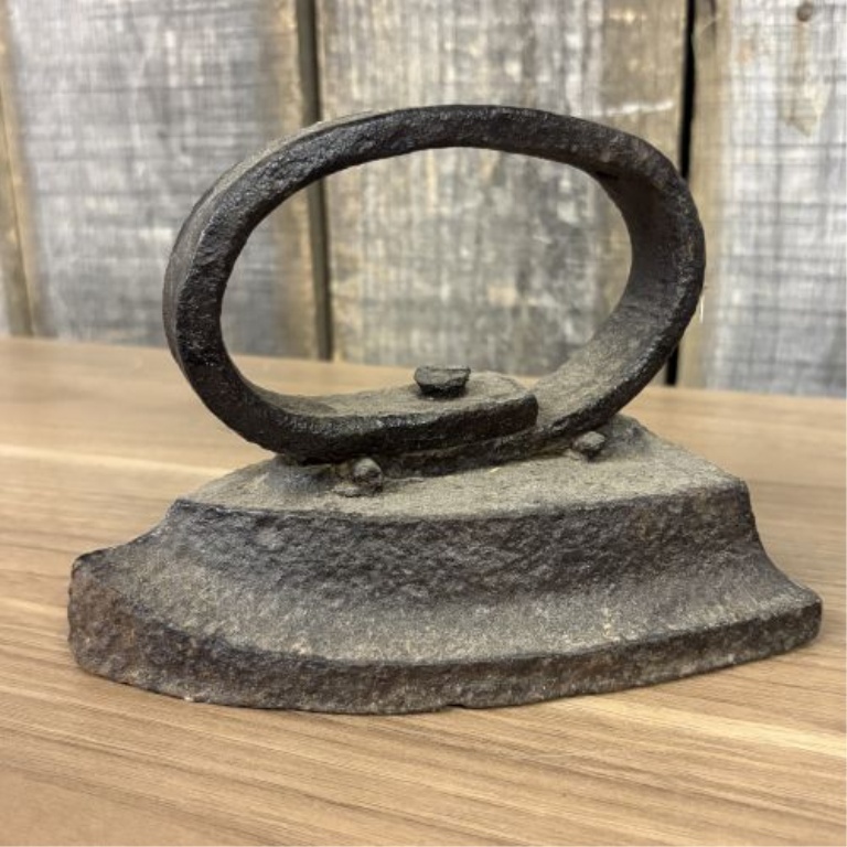 A Group of Antique Cast Iron Sad Irons