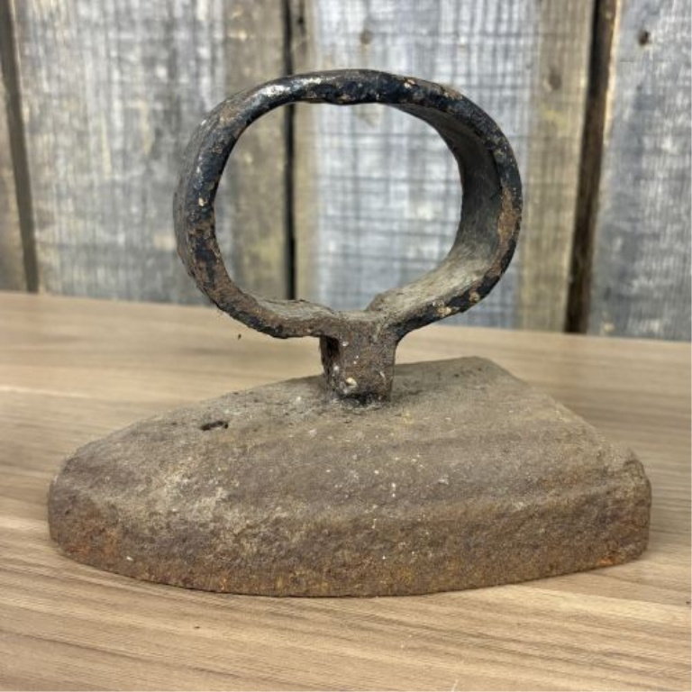 A Group of Antique Cast Iron Sad Irons