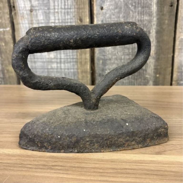 A Group of Antique Cast Iron Sad Irons