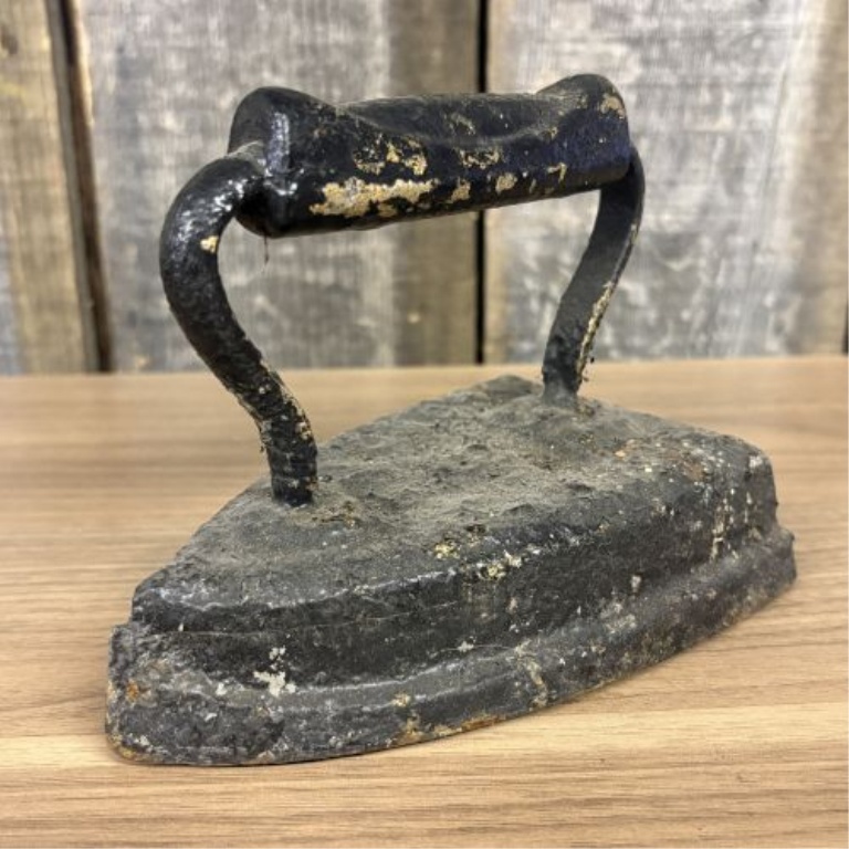 A Group of Antique Cast Iron Sad Irons