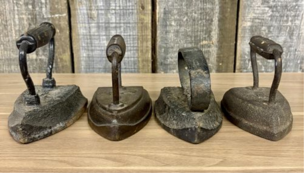 Four Antique American Cast Iron Sad Irons