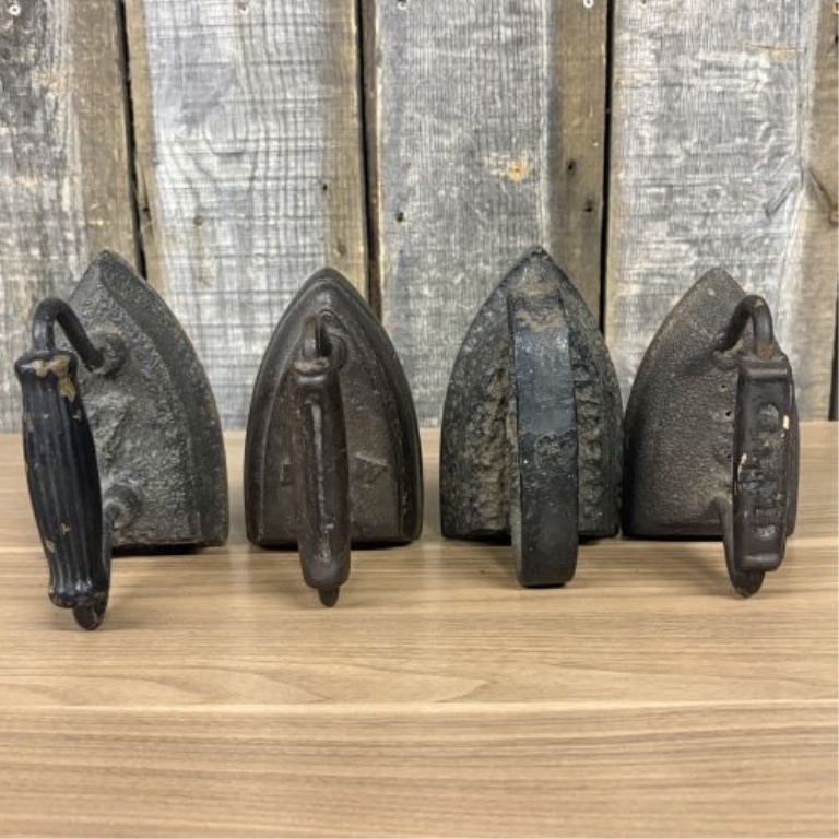 Four Antique American Cast Iron Sad Irons