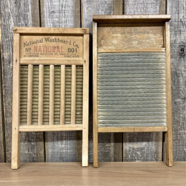 A Trio of Vintage American Wooden Washboards including National No. 801 and The Brass King