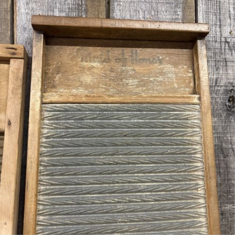 A Trio of Vintage American Wooden Washboards including National No. 801 and The Brass King