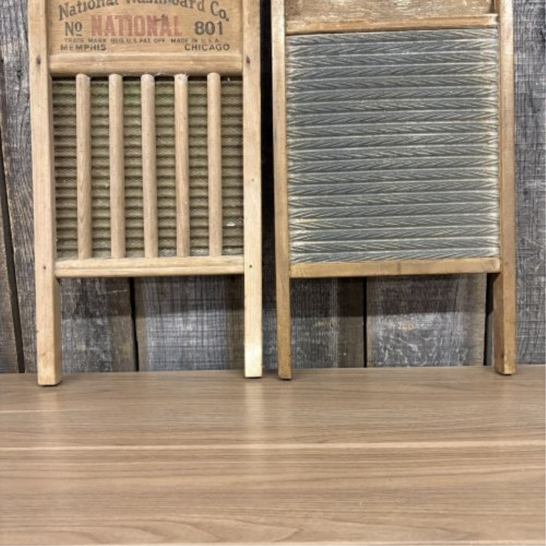 A Trio of Vintage American Wooden Washboards including National No. 801 and The Brass King