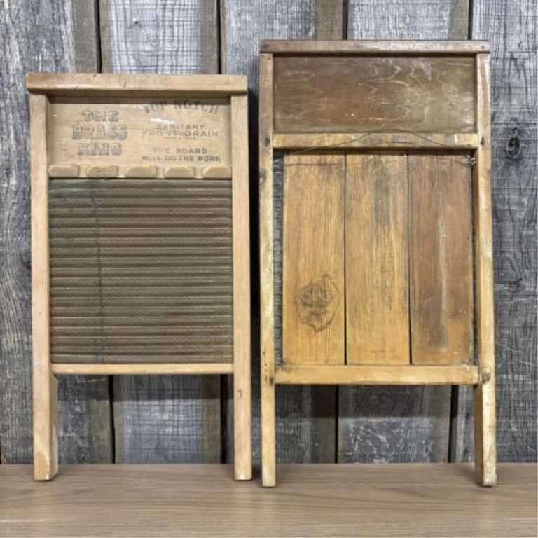 A Trio of Vintage American Wooden Washboards including National No. 801 and The Brass King