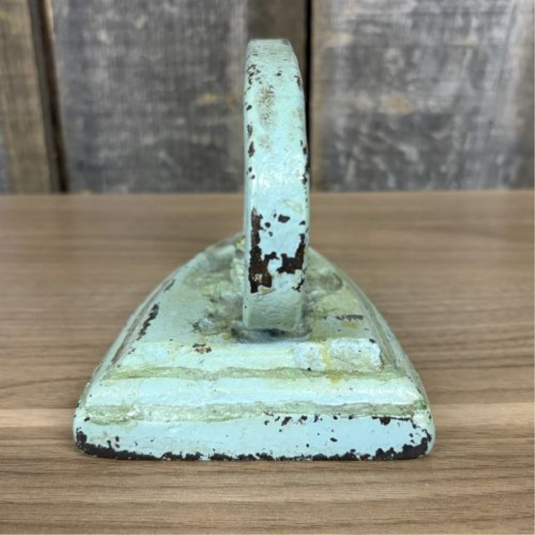 A Pair of Antique Cast Iron Miniature Sad Iron and Matching Footed Trivet