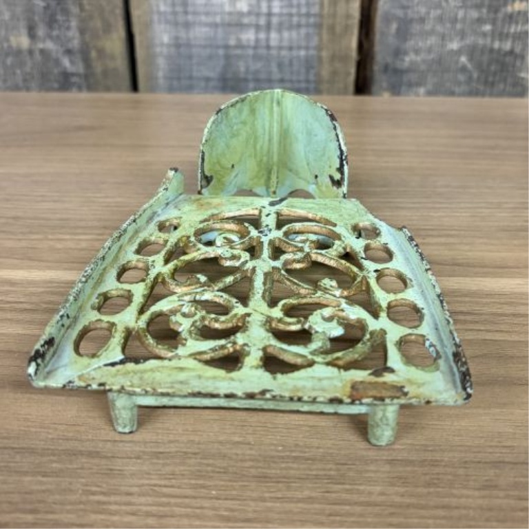 A Pair of Antique Cast Iron Miniature Sad Iron and Matching Footed Trivet