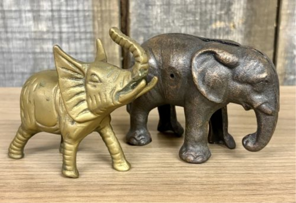 Two Elephant Figurines including a Still Bank and a Trunk Up Figure