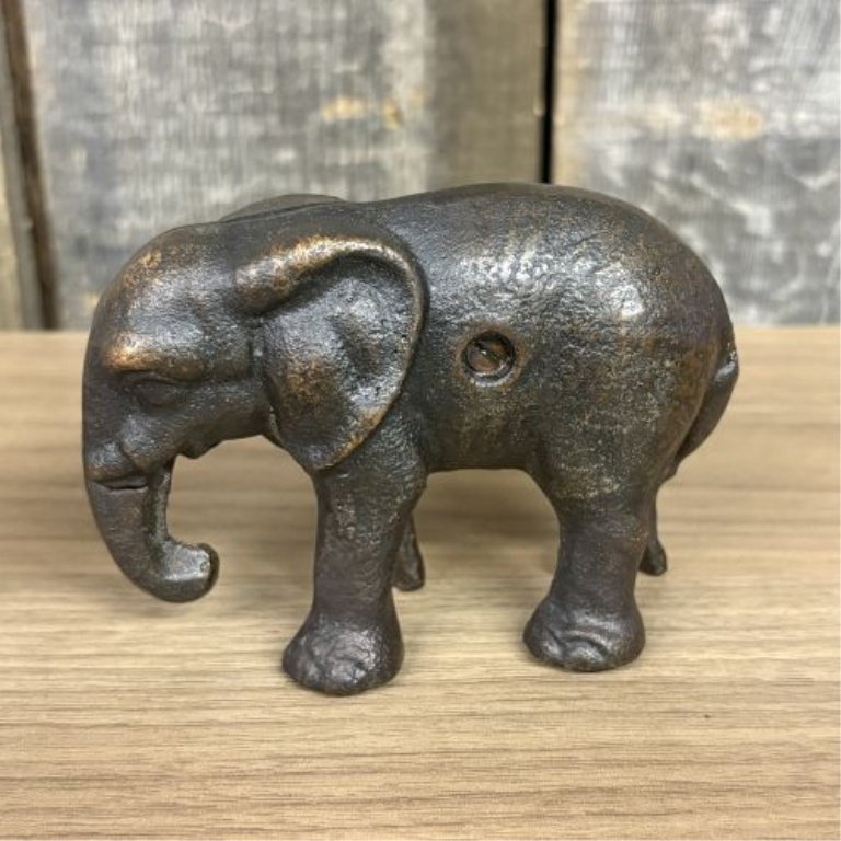Two Elephant Figurines including a Still Bank and a Trunk Up Figure