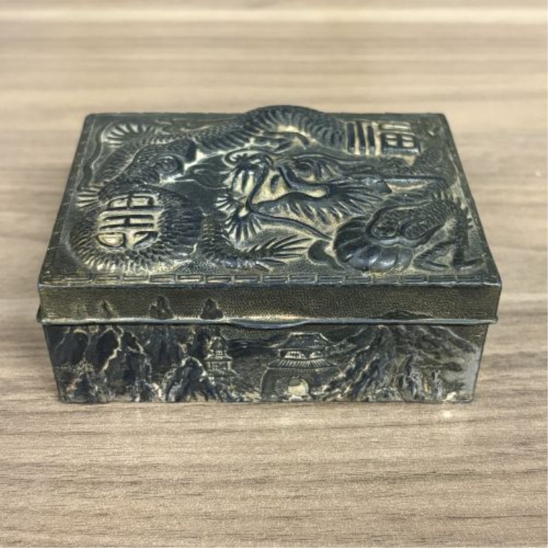 A Trio of Asian Style Decorative Metal and Wood Trinket Boxes