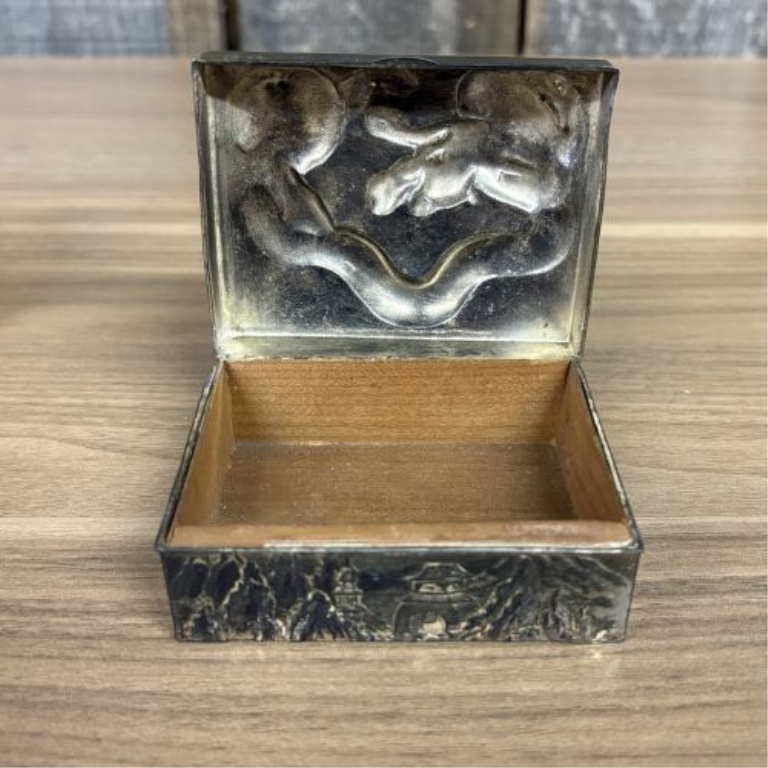A Trio of Asian Style Decorative Metal and Wood Trinket Boxes