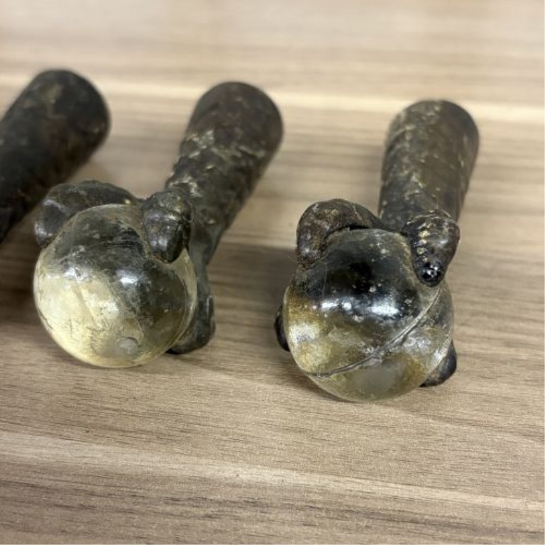 A Set of Antique Cast Iron and Glass Ball Claw Ferrule Feet