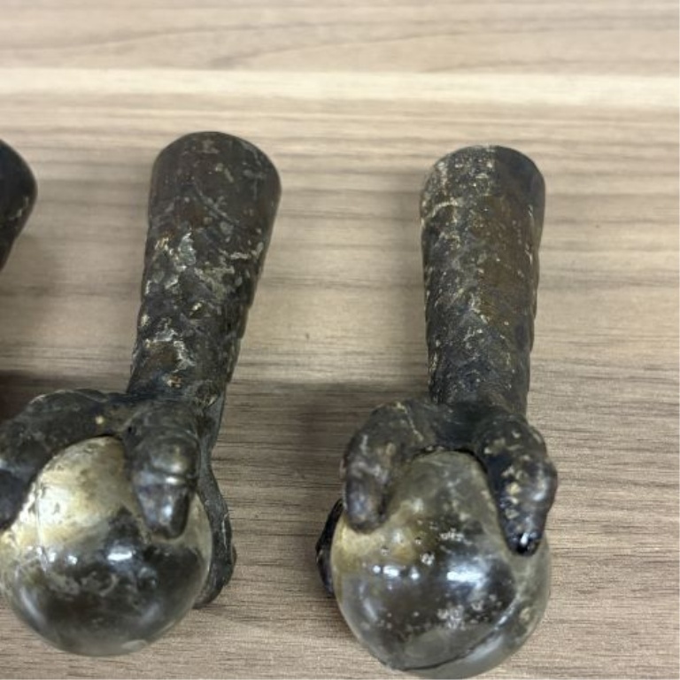 A Set of Antique Cast Iron and Glass Ball Claw Ferrule Feet