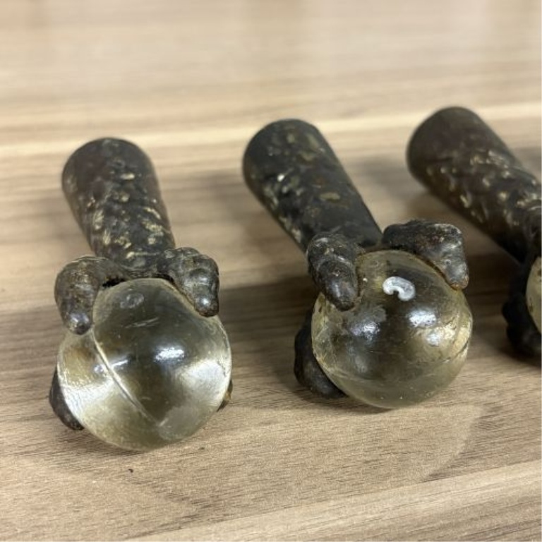 A Set of Antique Cast Iron and Glass Ball Claw Ferrule Feet