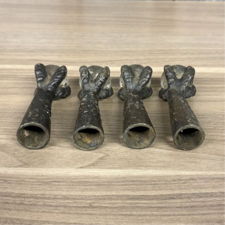 A Set of Antique Cast Iron and Glass Ball Claw Ferrule Feet