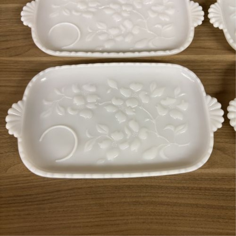 A Set of Four MacBeth-Evans Dogwood Pattern Milk Glass Snack Trays
