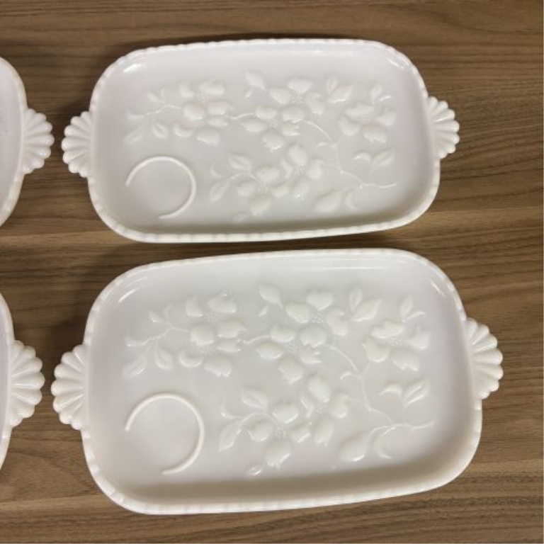 A Set of Four MacBeth-Evans Dogwood Pattern Milk Glass Snack Trays