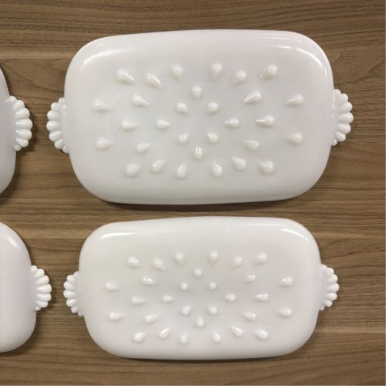 A Set of Four MacBeth-Evans Dogwood Pattern Milk Glass Snack Trays
