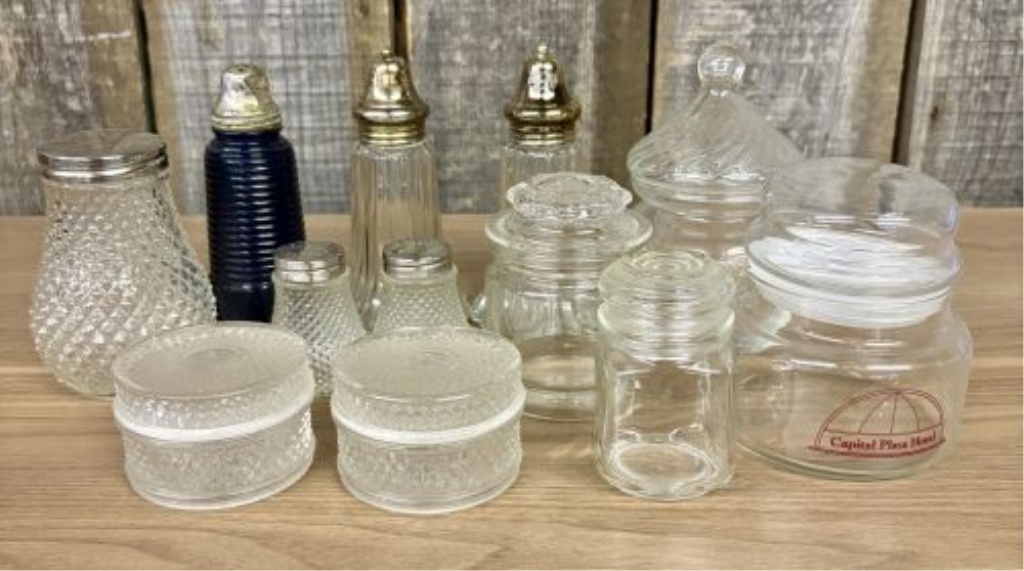 A Collection of Vintage Clear and Cobalt Blue Glass Salt and Pepper Shakers, Dresser Jars, and Lidded Containers