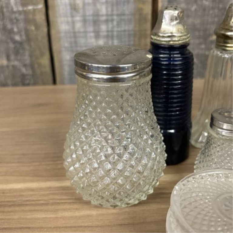 A Collection of Vintage Clear and Cobalt Blue Glass Salt and Pepper Shakers, Dresser Jars, and Lidded Containers
