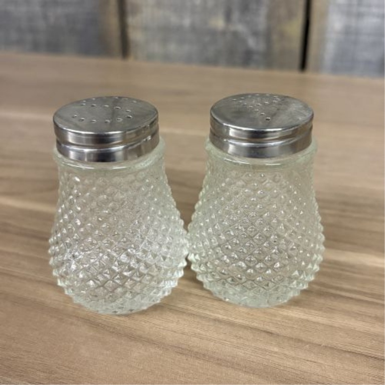 A Collection of Vintage Clear and Cobalt Blue Glass Salt and Pepper Shakers, Dresser Jars, and Lidded Containers