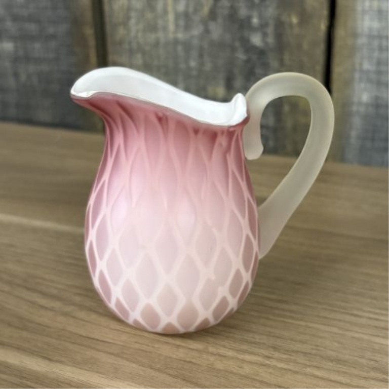 An Assortment of Vintage Art Glass, Milk Glass, and Carved Stone Items