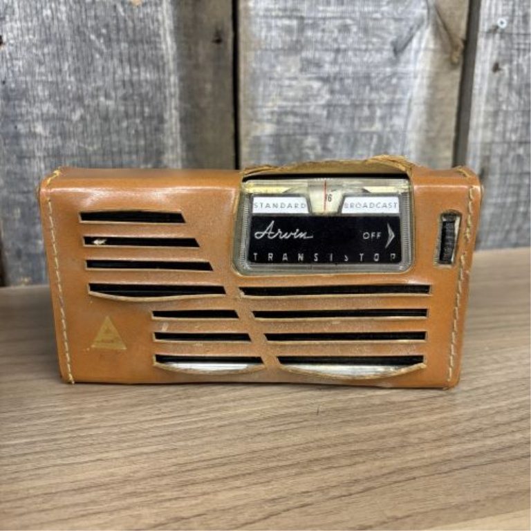 A Trio of Vintage Items Including Kodak Brownie Target Six-16 Camera Kodak Brownie Holiday Camera and Arvin Transistor Radio
