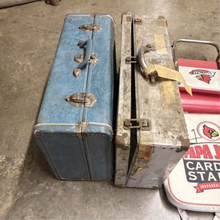 An Assortment of Vintage Luggage, University of Louisville Sports Memorabilia, and Advertising Tins