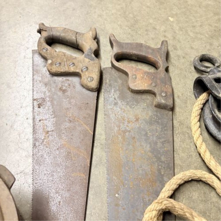 A Collection of Antique and Vintage Utilitarian Items Including Hand Saws and Cast Iron Hardware
