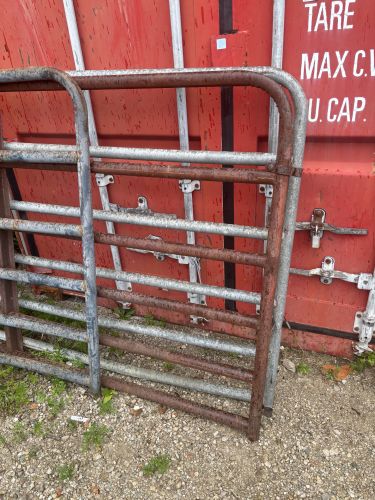 A Collection of Tubular Steel Livestock Corral Panels and Gates