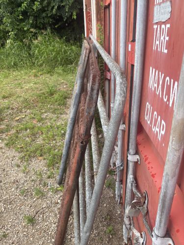 A Collection of Tubular Steel Livestock Corral Panels and Gates