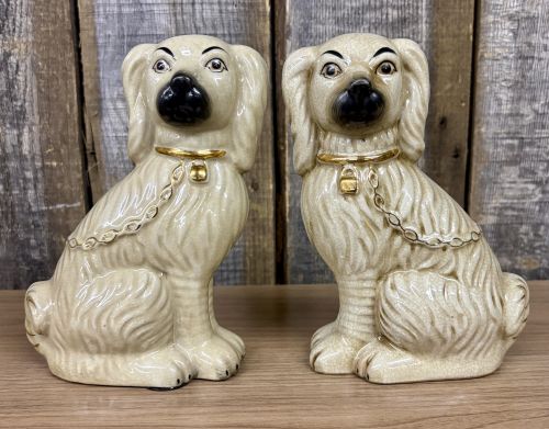 A Pair of Carlton Varney Ceramic Staffordshire Spaniel Figurines