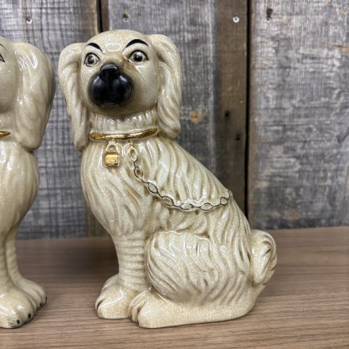 A Pair of Carlton Varney Ceramic Staffordshire Spaniel Figurines