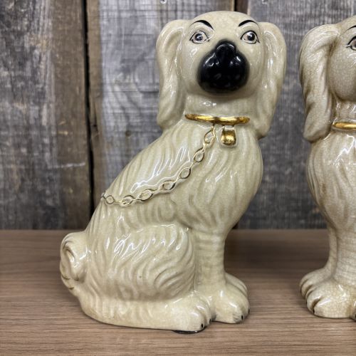 A Pair of Carlton Varney Ceramic Staffordshire Spaniel Figurines