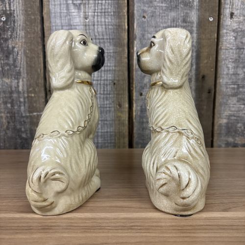 A Pair of Carlton Varney Ceramic Staffordshire Spaniel Figurines