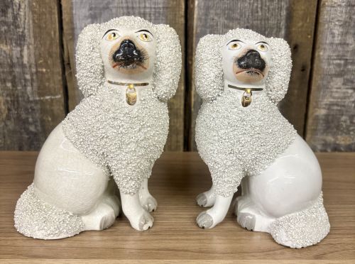 A Pair of Staffordshire Confetti Poodle Figurines