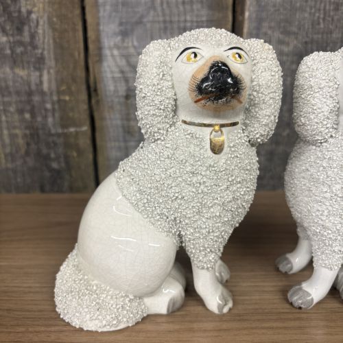 A Pair of Staffordshire Confetti Poodle Figurines