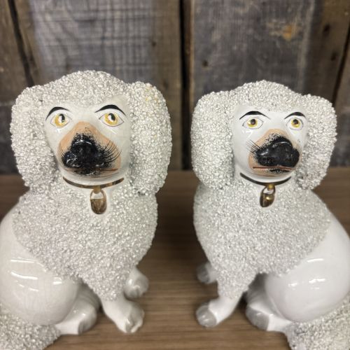 A Pair of Staffordshire Confetti Poodle Figurines