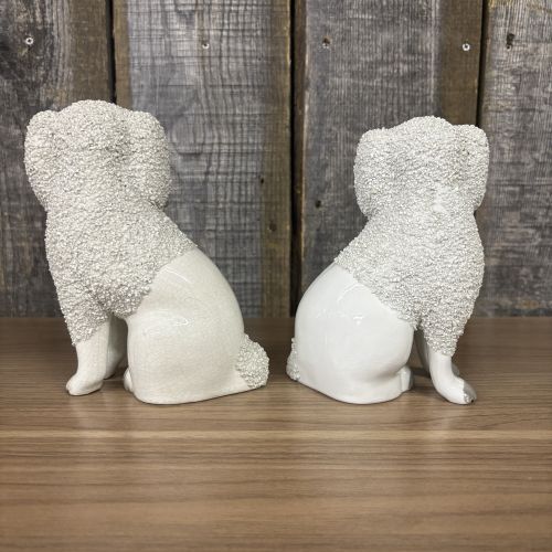 A Pair of Staffordshire Confetti Poodle Figurines