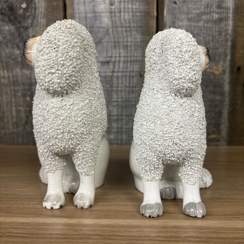 A Pair of Staffordshire Confetti Poodle Figurines