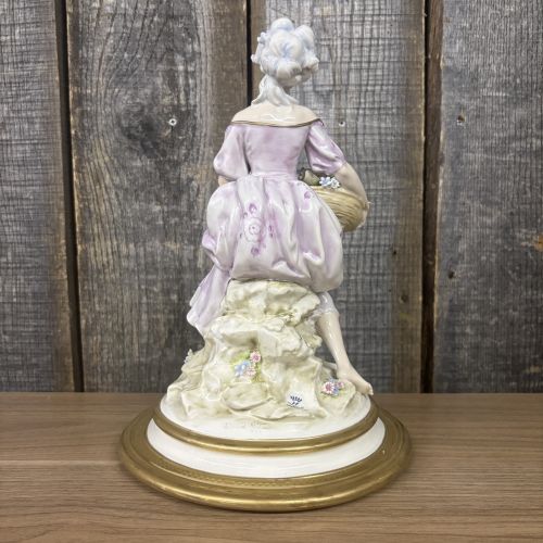 Capodimonte Cesare Villari Porcelain Figurine of a Seated Lady with Flower Basket