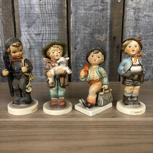 Set of Four Goebel Hummel Hand-Painted Porcelain Figurines