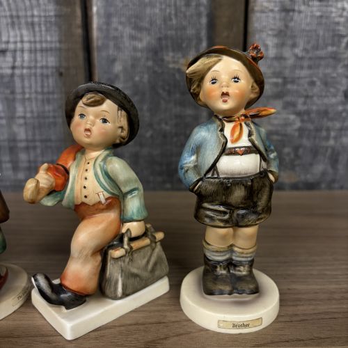 Set of Four Goebel Hummel Hand-Painted Porcelain Figurines