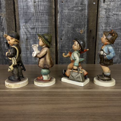 Set of Four Goebel Hummel Hand-Painted Porcelain Figurines