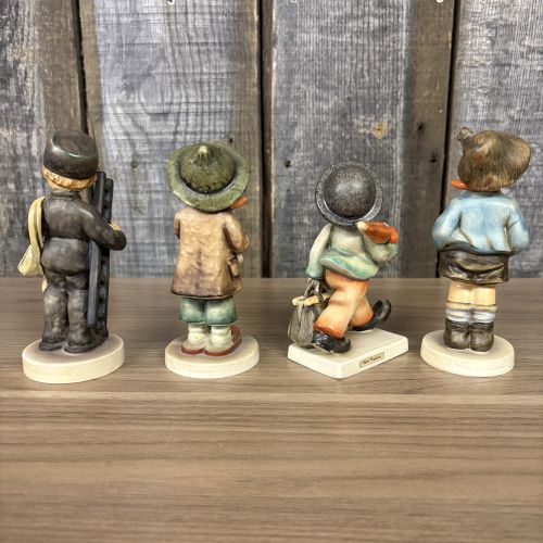 Set of Four Goebel Hummel Hand-Painted Porcelain Figurines