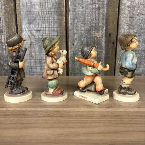 Set of Four Goebel Hummel Hand-Painted Porcelain Figurines