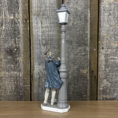 Lladro Glazed Porcelain Figurine The Lamplighter Model 5205