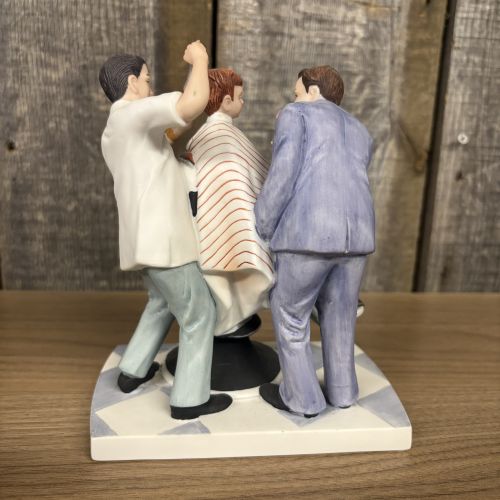 A Collection of Four Norman Rockwell Inspired Porcelain Figurines by Gorham and The Norman Rockwell Museum